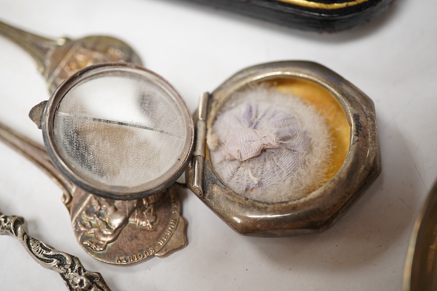A modern silver shell dish on dolphin support, by Mappin & Webb, Sheffield, 1987, height 11cm, together with a cased set of six late Victorian parcel gilt silver apostle teaspoons, a 1960's small silver dish with Winston